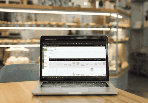 Outlet management system analytics dashboard displaying sales, inventory, staff, and branch performance.