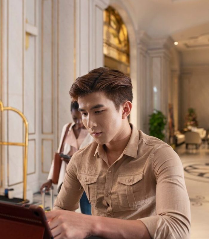 Hotel owners dealing with daily management challenges using hotel management software