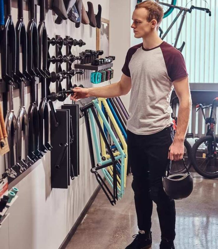 Sports store owner facing daily challenges in managing inventory stock tracking billing errors and order handling using sports equipment inventory software